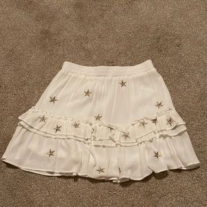 White skirt with gold stars